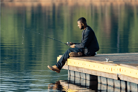 Austin fishing at a fishing spot